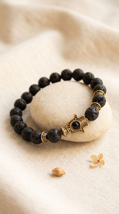 Pulsera de Piedra Preciosa (Hamsa de Oro / Piedra de Lava): Protección Inquebrantable, Fuerza Telúrica y Éxito Absoluto (Mineral Natural)